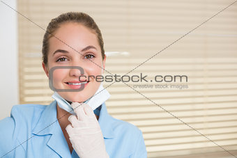 Dental assistant smiling at camera