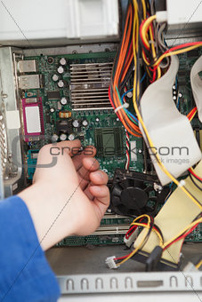 Computer engineer working on broken cpu