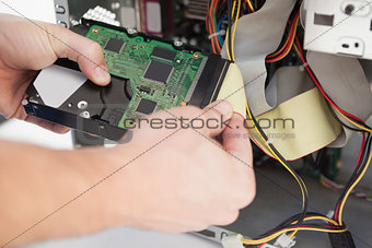 Computer engineer working on broken cpu