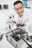 Weird computer engineer fixing broken cpu