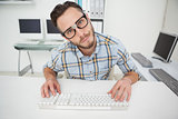 Nerdy businessman working on computer