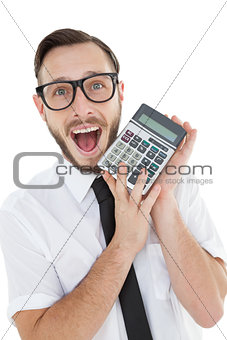 Nerdy excited businessman showing calculator