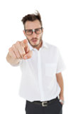 Nerdy businessman pointing at camera