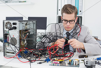Computer engineer working on broken console
