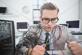 Computer engineer working on broken cables