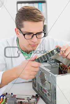 Technician working on broken cpu