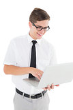 Nerdy businessman holding his laptop