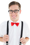 Nerdy hipster pulling his suspenders