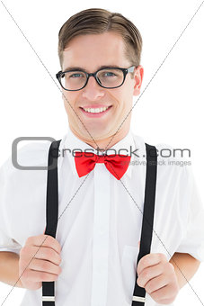Nerdy hipster pulling his suspenders