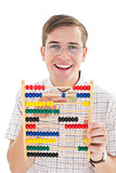 Nerdy hipster adding on abacus