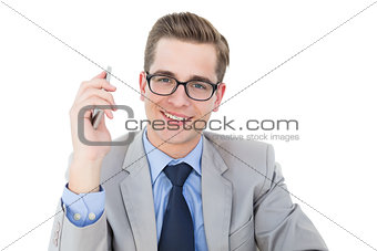 Nerdy businessman holding his smartphone