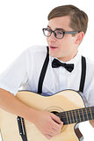 Nerdy hipster playing the guitar