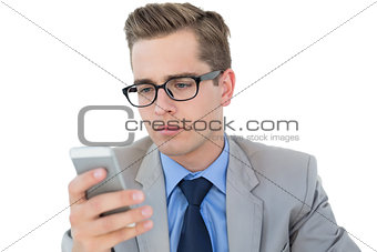 Nerdy businessman sending a text