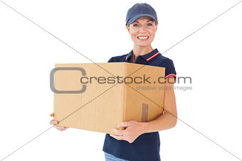 Happy delivery woman holding cardboard box