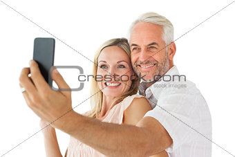 Happy couple posing for a selfie