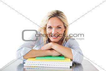 Smiling mature students leaning on her books