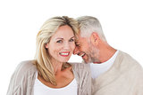 Happy couple laughing together woman looking at camera