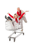 Happy couple messing about in shopping trolley
