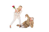 Angry woman attacking partner with rose bouquet