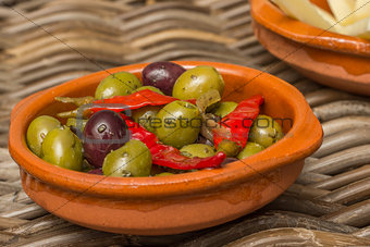 Tapas, marinated olives with red peppers