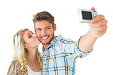 Attractive couple taking a selfie together