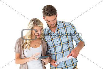 Attractive couple working out their finances