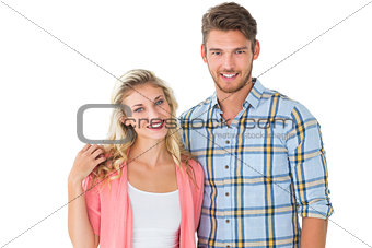 Attractive young couple smiling at camera