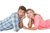 Attractive young couple lying and thinking