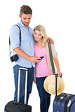 Attractive young couple ready to go on vacation