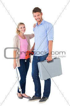 Young couple holding diy tools