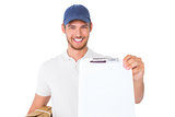 Happy delivery man holding cardboard box and clipboard