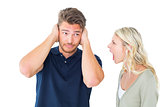 Man not listening to his shouting girlfriend