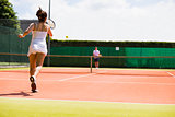 Tennis match in progress on the court