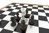 White king surrounded by black pawns