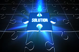 Blue solution glowing jigsaw piece on puzzle