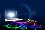 Laptop with colourful spiral design