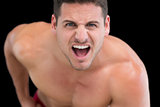 Close up portrait of young muscular man shouting