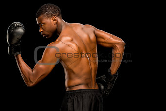 Shirtless muscular boxer