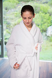 Young woman wearing a bathrobe