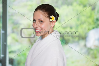 Portrait of a beautiful young woman in bathrobe