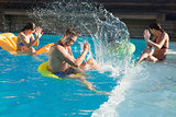 People playing in the swimming pool