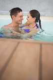 Romantic couple in swimming pool