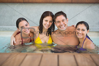 Cheerful people in the swimming pool