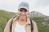 Close up portrait of a happy hiking man