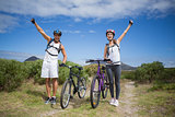 Athletic couple mountain biking