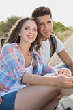 Couple sitting on countryside road