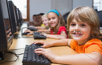 Cute pupils in computer class