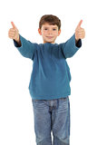 Happy little boy showing thumbs up