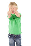 Cute little boy showing thumbs up