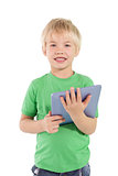Cute little boy using tablet pc